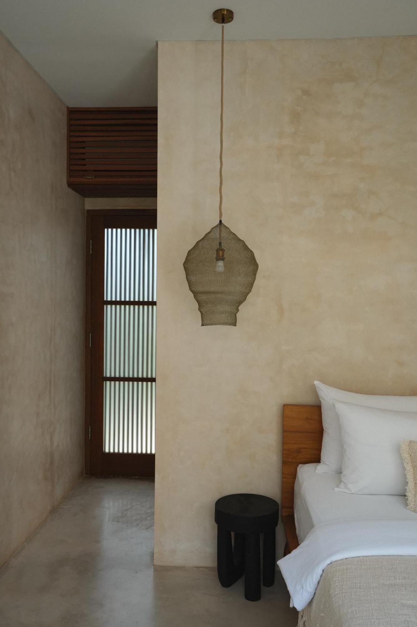 Alma Bingin Boutique Hotel Uluwatu Quarto foto